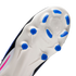 Close-up of a white Nike soccer cleat's soleplate with blue studs and "NIKE CYCLONE 360" text. A pink detail is visible on the side, set against a black background.