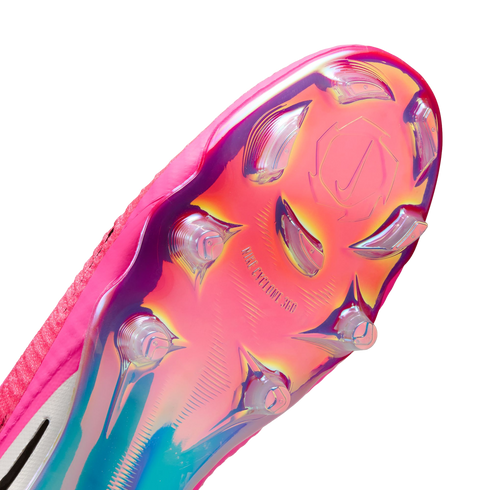 Close-up of a pink iridescent Nike soccer cleat sole featuring clear studs and embossed "NIKE CYCLONE 360" branding.
