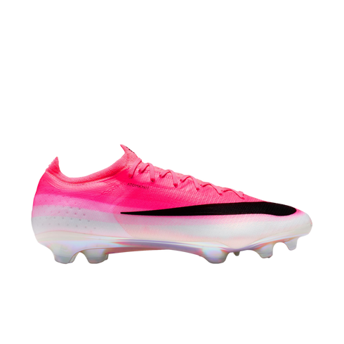Vibrant pink and white Nike soccer cleat with a black Swoosh, shown from a side profile against a white background.