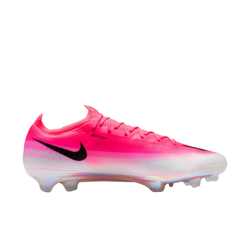A pink and white Nike soccer cleat with a black swoosh and an iridescent soleplate, shown from a side profile against a white background.