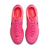 A top-down view of a pair of vibrant pink Nike Tiempo Ligera sneakers with matching pink laces and black branding on a white background.
