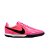 Side profile of a vibrant pink Nike React Gato indoor soccer shoe with a black swoosh, white midsole, and black rubber outsole.