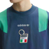 Close-up of a navy blue Adidas shirt with green shoulder panels, featuring the Adidas logo and the Italian national football team crest with four stars.