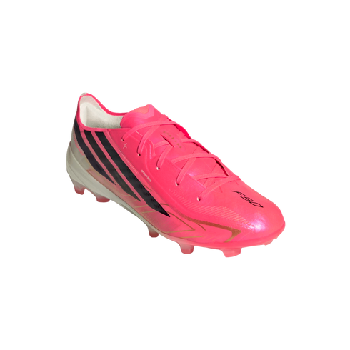 A bright pink Adidas F50 soccer cleat with three black diagonal stripes on the side, set against a plain white background.