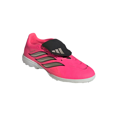 A bright pink Adidas Predator soccer shoe with a black fold-over tongue, silver stripes, and a white sole.