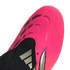 Close-up of a bright pink Adidas soccer cleat showing textured patterns, black accents, a silver logo, and 'NANOSTRIKE' lettering on the forefoot.