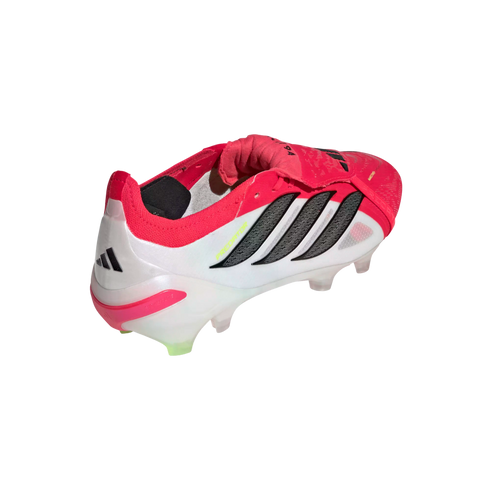 Rear three-quarter view of a white Adidas Predator soccer cleat with pink and black accents on a solid black background.