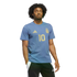 Man with curly hair wearing a light blue Argentina t-shirt with a gold number 10, posing against a solid black background.