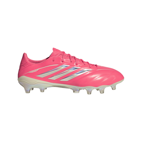 Vibrant pink Adidas Copa soccer cleat with iridescent silver three-stripes and a white soleplate, shown from the side.