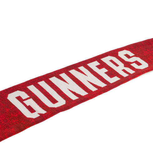 A red textured scarf with "GUNNERS" printed in large, bold white capital letters, angled against a white background.