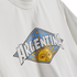 A white t-shirt featuring a diamond-shaped graphic with the word "ARGENTINA" in bold letters over a yellow sun with a face and three gold stars.