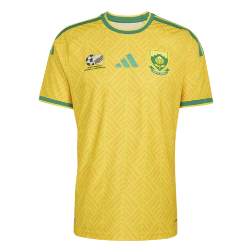 A yellow South African national soccer jersey with green trim, featuring the team crest, Adidas logo, and SAFA emblem on a textured chevron pattern.