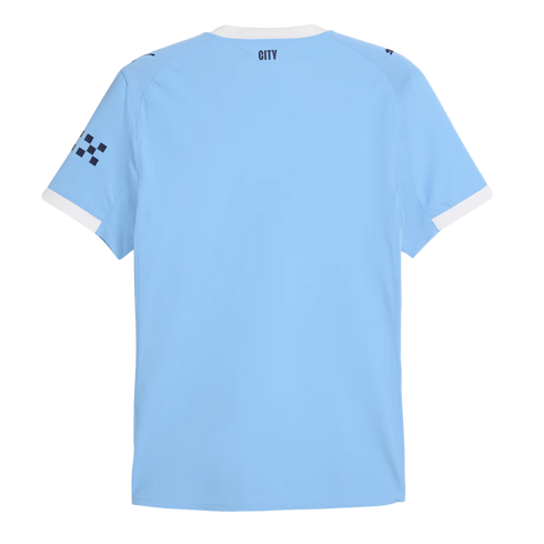 Back view of a light blue short-sleeved soccer jersey with white trim on the collar and sleeves. The word "CITY" is printed in dark blue on the upper back neck.
