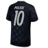 A navy blue soccer jersey viewed from the back, featuring the name "PULISIC" and the number "10" in white. The jersey has a subtle all-over pattern of stars and thin red piping along the shoulder seams.