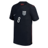 A dark blue USA national team soccer jersey featuring a large white number 8 centered on the front. The jersey includes a white Nike swoosh on the right chest, the USA soccer crest on the left, and subtle embossed star patterns throughout the fabric with