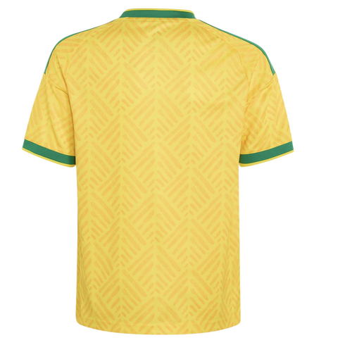 Back view of a yellow sports jersey with green trim on the collar and sleeves, featuring a subtle diagonal hatch pattern.
