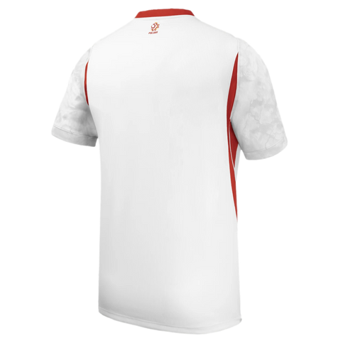 Back view of a white sports jersey with red side panels, red collar, grey patterned sleeves, and a small gold "POLSKA" logo on the back neck.