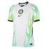 White Nike Nigeria soccer jersey with light green flame graphics on the sleeves and sides. Features a centered NFF crest and Nike swoosh.