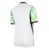 Back view of a white sports jersey with black trim and green flame-patterned short sleeves. "AERO-FIT" is printed on the bottom right hem.