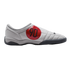 Side profile of a grey Nike Total 90 indoor soccer shoe with a large red circular patch featuring a black "90" and a dark grey sole.