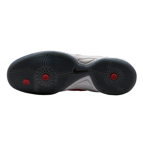 Bottom view of a grey Nike athletic shoe outsole featuring a herringbone traction pattern with three red circular accents, set against a plain white background.